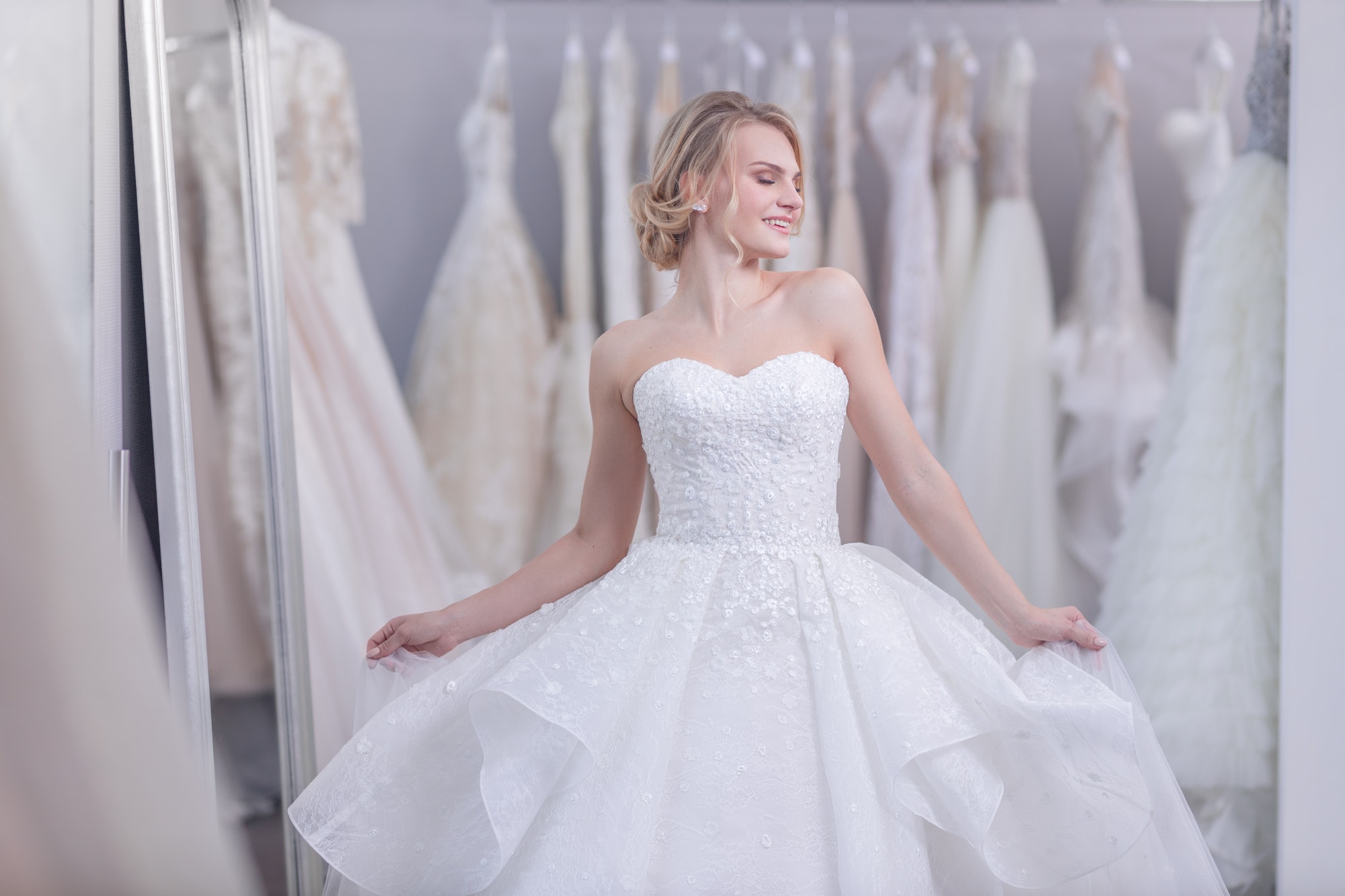 Attractive young girl in wedding dress